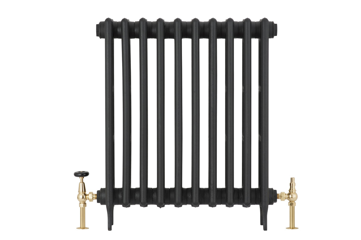 Grace Manual Radiator Valve Set in brass, fitted to black radiator